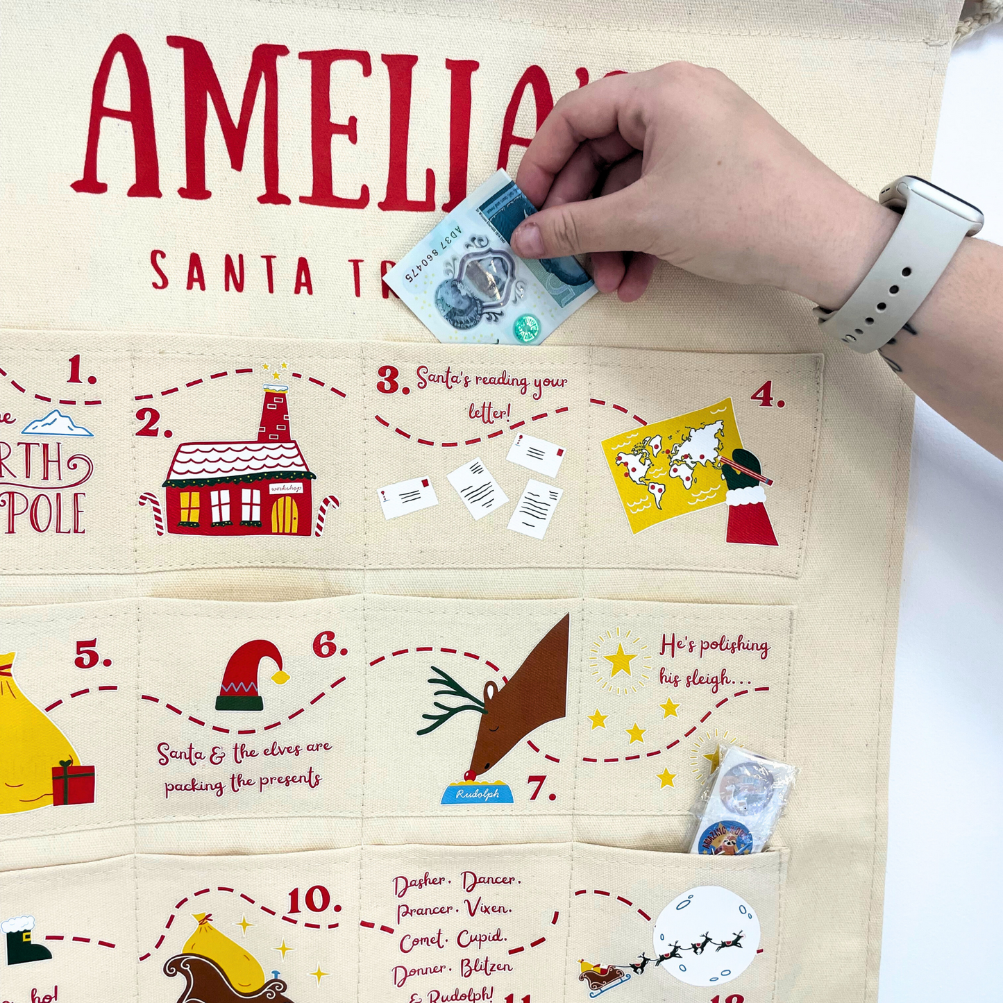 High-quality image of the reusable canvas Christmas advent calendar with Santa on his sleigh.