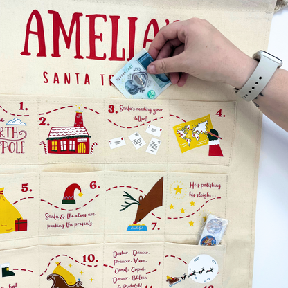 High-quality image of the reusable canvas Christmas advent calendar with Santa on his sleigh.