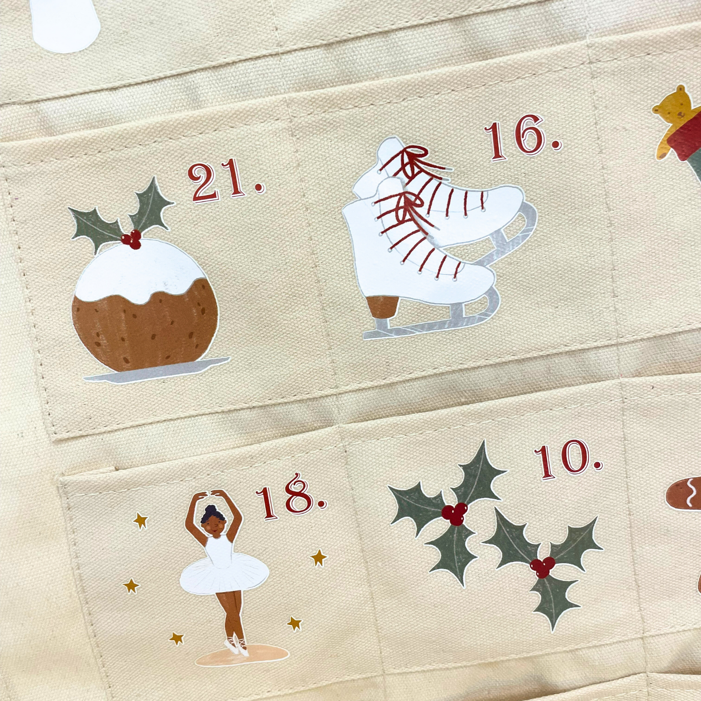 Personalised advent calendar with Santa design and numbered fabric pockets