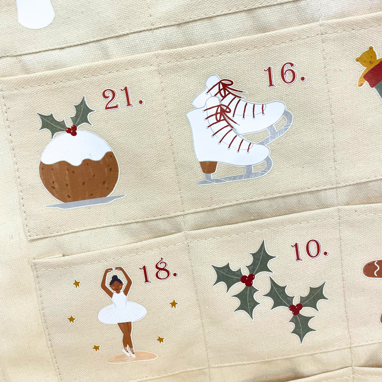 Personalised advent calendar with Santa design and numbered fabric pockets
