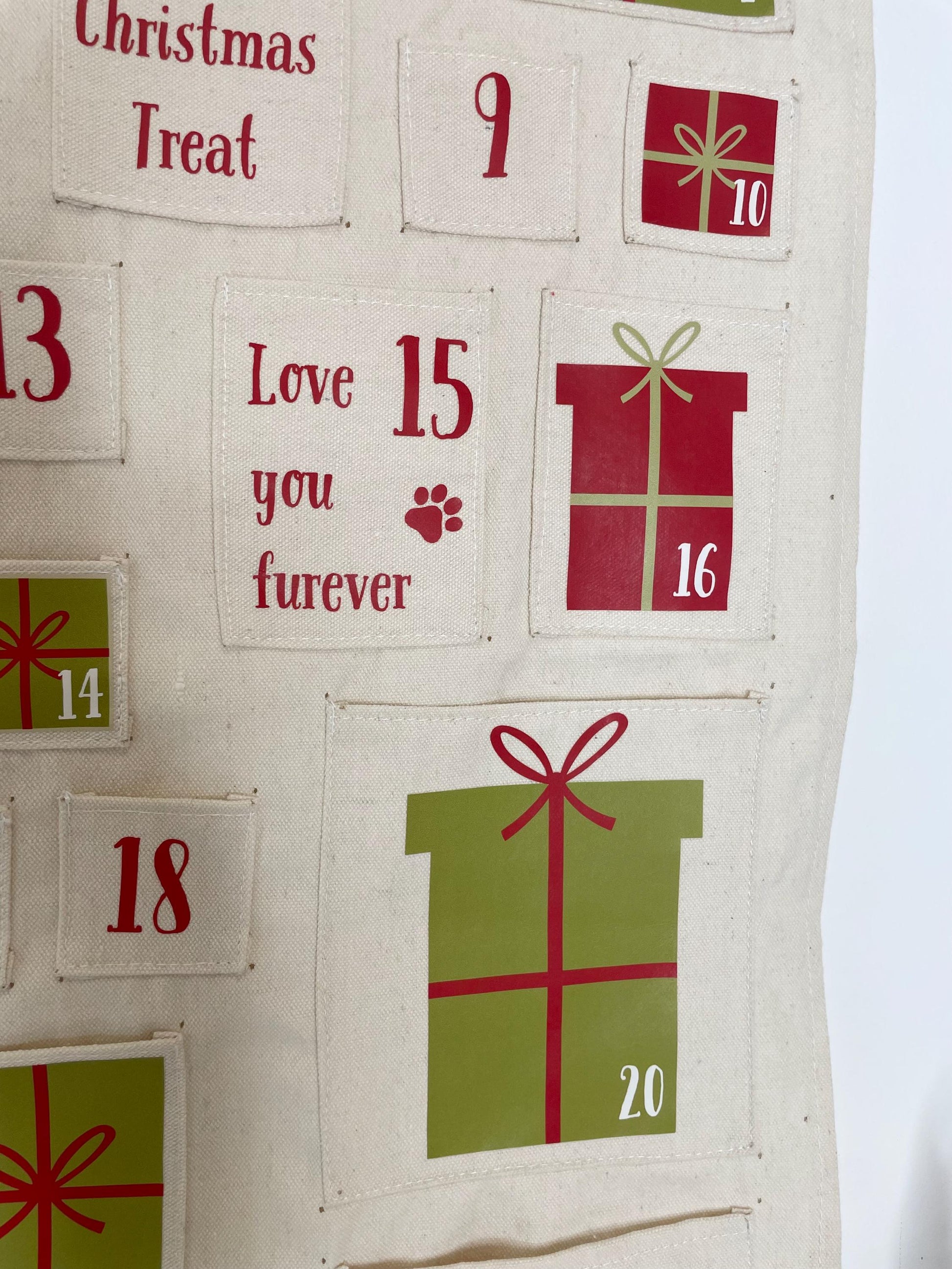 Personalised fabric advent calendar for pets with 24 treat pockets