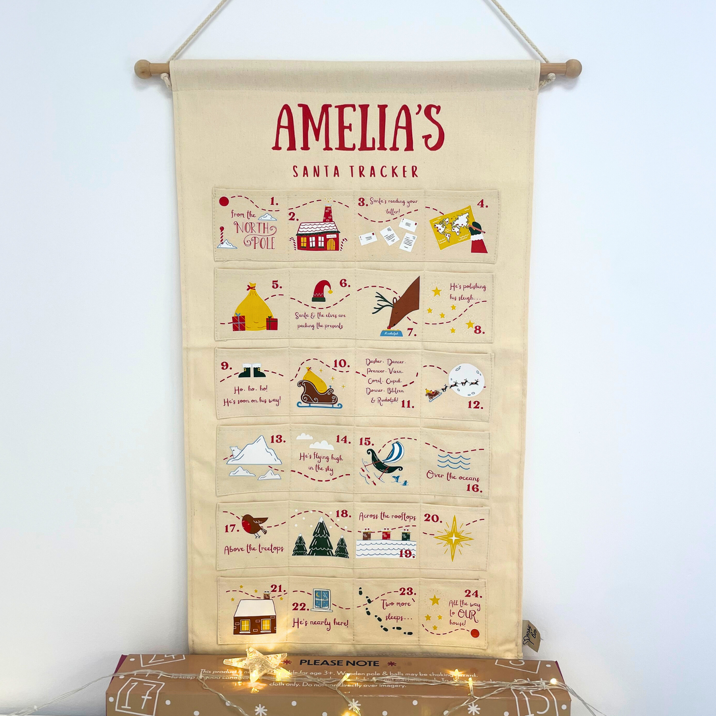 The hand-drawn detail and fabric texture of the personalised Santa Tracker advent calendar.