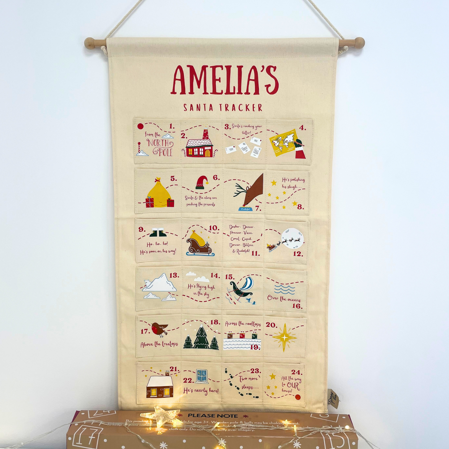 The hand-drawn detail and fabric texture of the personalised Santa Tracker advent calendar.