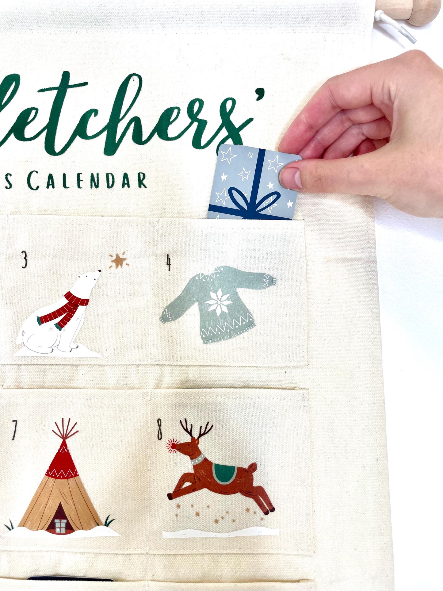 Woodland-themed fabric advent calendar customised with family name